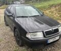 Черный Шкода Октавия, объемом двигателя 1.6 л и пробегом 270 тыс. км за 5600 $, фото 3 на Automoto.ua