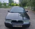 Черный Шкода Октавия, объемом двигателя 1.6 л и пробегом 177 тыс. км за 5800 $, фото 1 на Automoto.ua