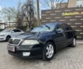 Черный Шкода Октавия, объемом двигателя 1.8 л и пробегом 182 тыс. км за 6400 $, фото 1 на Automoto.ua