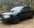 Черный Шкода Октавия, объемом двигателя 1.6 л и пробегом 286 тыс. км за 5500 $, фото 1 на Automoto.ua