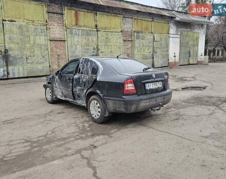 Черный Шкода Октавия, объемом двигателя 1.6 л и пробегом 210 тыс. км за 2350 $, фото 4 на Automoto.ua