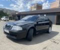 Черный Шкода Октавия, объемом двигателя 1.8 л и пробегом 268 тыс. км за 8000 $, фото 1 на Automoto.ua
