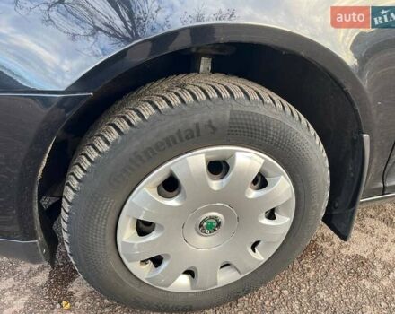 Черный Шкода Октавия, объемом двигателя 1.6 л и пробегом 210 тыс. км за 5900 $, фото 10 на Automoto.ua