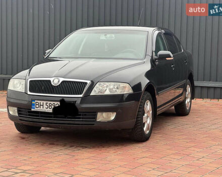 Черный Шкода Октавия, объемом двигателя 2 л и пробегом 230 тыс. км за 6950 $, фото 1 на Automoto.ua
