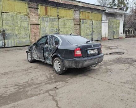 Черный Шкода Октавия, объемом двигателя 1.6 л и пробегом 210 тыс. км за 2350 $, фото 3 на Automoto.ua