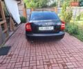 Черный Шкода Октавия, объемом двигателя 1.6 л и пробегом 315 тыс. км за 6900 $, фото 1 на Automoto.ua