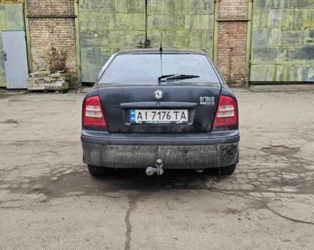 Черный Шкода Октавия, объемом двигателя 1.6 л и пробегом 210 тыс. км за 2350 $, фото 2 на Automoto.ua