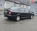 Черный Шкода Октавия, объемом двигателя 1.6 л и пробегом 210 тыс. км за 2200 $, фото 1 на Automoto.ua