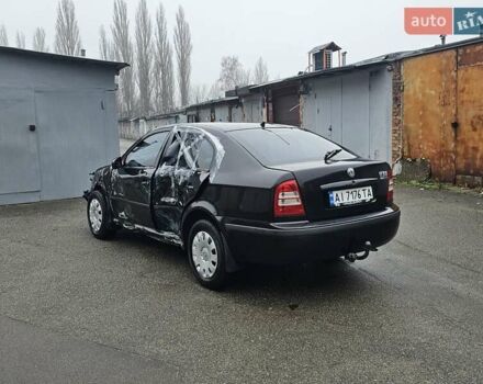 Черный Шкода Октавия, объемом двигателя 1.6 л и пробегом 210 тыс. км за 2000 $, фото 7 на Automoto.ua