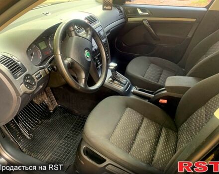 Чорний Шкода Октавія, об'ємом двигуна 2 л та пробігом 220 тис. км за 6999 $, фото 5 на Automoto.ua