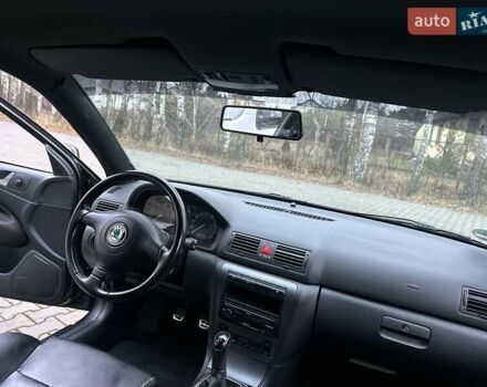 Черный Шкода Октавия, объемом двигателя 1.8 л и пробегом 164 тыс. км за 7500 $, фото 8 на Automoto.ua