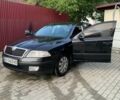 Черный Шкода Октавия, объемом двигателя 1.6 л и пробегом 280 тыс. км за 5500 $, фото 1 на Automoto.ua