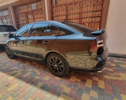 Черный Шкода Октавия, объемом двигателя 2 л и пробегом 198 тыс. км за 7800 $, фото 1 на Automoto.ua