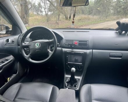 Черный Шкода Октавия, объемом двигателя 1.6 л и пробегом 286 тыс. км за 5500 $, фото 10 на Automoto.ua