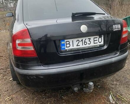 Черный Шкода Октавия, объемом двигателя 1.6 л и пробегом 213 тыс. км за 6200 $, фото 1 на Automoto.ua