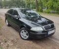 Черный Шкода Октавия, объемом двигателя 2 л и пробегом 190 тыс. км за 6500 $, фото 1 на Automoto.ua