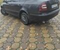 Черный Шкода Октавия, объемом двигателя 1.6 л и пробегом 315 тыс. км за 6300 $, фото 2 на Automoto.ua