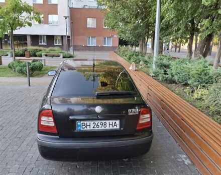 Черный Шкода Октавия, объемом двигателя 1.6 л и пробегом 258 тыс. км за 4800 $, фото 5 на Automoto.ua