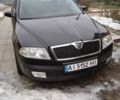 Черный Шкода Октавия, объемом двигателя 1.6 л и пробегом 207 тыс. км за 7100 $, фото 1 на Automoto.ua