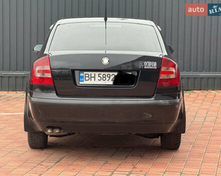 Черный Шкода Октавия, объемом двигателя 2 л и пробегом 230 тыс. км за 6950 $, фото 6 на Automoto.ua