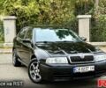 Черный Шкода Октавия, объемом двигателя 1.8 л и пробегом 210 тыс. км за 6500 $, фото 1 на Automoto.ua