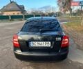 Черный Шкода Октавия, объемом двигателя 1.6 л и пробегом 210 тыс. км за 5900 $, фото 1 на Automoto.ua