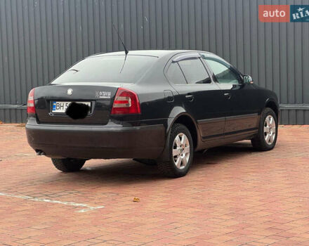 Черный Шкода Октавия, объемом двигателя 2 л и пробегом 230 тыс. км за 6950 $, фото 7 на Automoto.ua