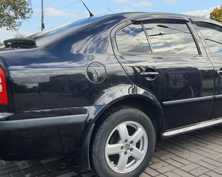 Чорний Шкода Октавія, об'ємом двигуна 1 л та пробігом 225 тис. км за 6500 $, фото 7 на Automoto.ua