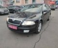 Черный Шкода Октавия, объемом двигателя 1.6 л и пробегом 198 тыс. км за 6999 $, фото 1 на Automoto.ua