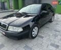 Черный Шкода Октавия, объемом двигателя 1.6 л и пробегом 215 тыс. км за 4950 $, фото 1 на Automoto.ua