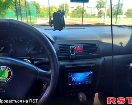 Черный Шкода Октавия, объемом двигателя 1.6 л и пробегом 225 тыс. км за 5900 $, фото 6 на Automoto.ua