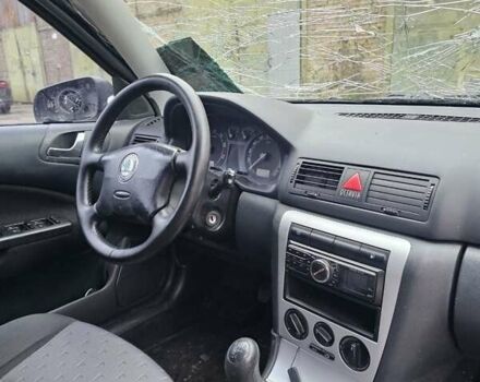 Черный Шкода Октавия, объемом двигателя 1.6 л и пробегом 210 тыс. км за 2350 $, фото 12 на Automoto.ua