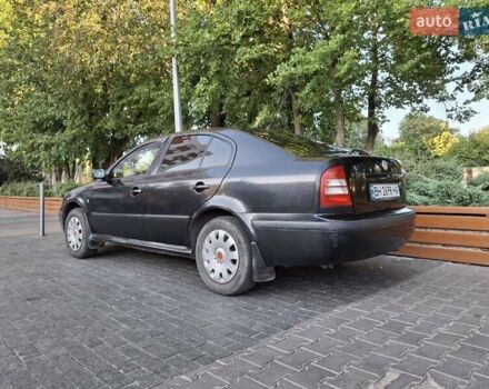 Черный Шкода Октавия, объемом двигателя 1.6 л и пробегом 258 тыс. км за 4800 $, фото 4 на Automoto.ua