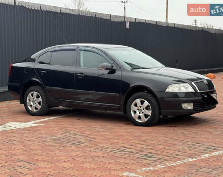 Черный Шкода Октавия, объемом двигателя 2 л и пробегом 230 тыс. км за 6950 $, фото 4 на Automoto.ua