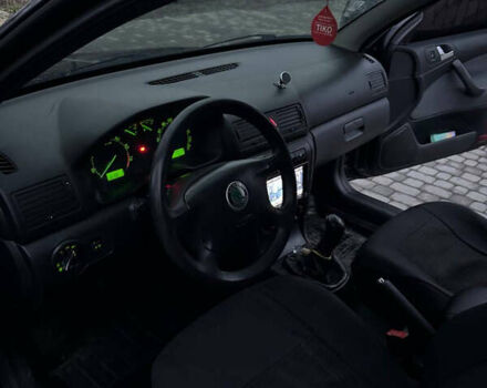 Черный Шкода Октавия, объемом двигателя 1.6 л и пробегом 245 тыс. км за 5400 $, фото 22 на Automoto.ua