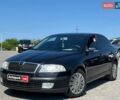 Черный Шкода Октавия, объемом двигателя 1.8 л и пробегом 345 тыс. км за 4800 $, фото 1 на Automoto.ua