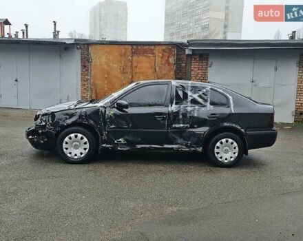 Черный Шкода Октавия, объемом двигателя 1.6 л и пробегом 210 тыс. км за 2000 $, фото 5 на Automoto.ua