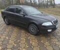 Черный Шкода Октавия, объемом двигателя 1.6 л и пробегом 315 тыс. км за 6300 $, фото 4 на Automoto.ua