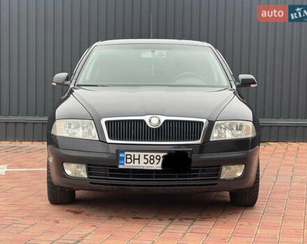 Черный Шкода Октавия, объемом двигателя 2 л и пробегом 230 тыс. км за 6950 $, фото 2 на Automoto.ua