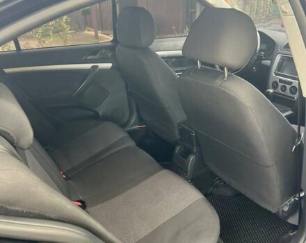 Черный Шкода Октавия, объемом двигателя 1.6 л и пробегом 290 тыс. км за 6350 $, фото 2 на Automoto.ua