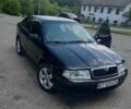 Черный Шкода Октавия, объемом двигателя 1.6 л и пробегом 330 тыс. км за 5600 $, фото 1 на Automoto.ua