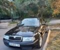 Черный Шкода Октавия, объемом двигателя 1.6 л и пробегом 243 тыс. км за 6000 $, фото 1 на Automoto.ua