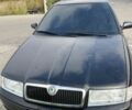Черный Шкода Октавия, объемом двигателя 1.8 л и пробегом 73 тыс. км за 10000 $, фото 1 на Automoto.ua