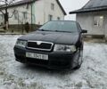 Черный Шкода Октавия, объемом двигателя 1.8 л и пробегом 310 тыс. км за 4000 $, фото 1 на Automoto.ua