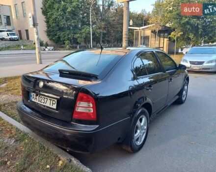 Черный Шкода Октавия, объемом двигателя 1.6 л и пробегом 243 тыс. км за 6000 $, фото 1 на Automoto.ua