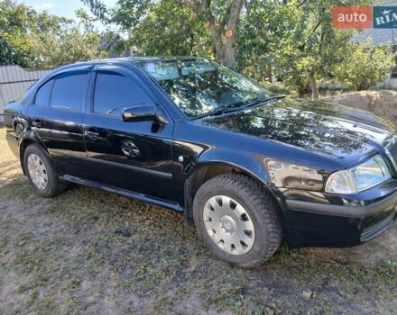 Черный Шкода Октавия, объемом двигателя 1.6 л и пробегом 183 тыс. км за 6000 $, фото 1 на Automoto.ua