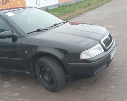 Черный Шкода Октавия, объемом двигателя 1.6 л и пробегом 250 тыс. км за 5700 $, фото 1 на Automoto.ua