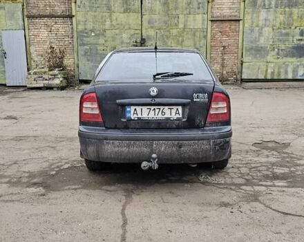 Черный Шкода Октавия, объемом двигателя 1.6 л и пробегом 210 тыс. км за 2350 $, фото 1 на Automoto.ua