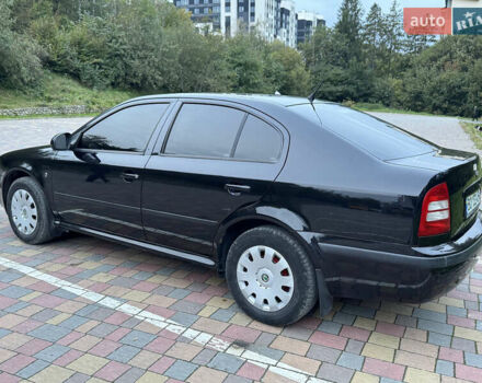 Черный Шкода Октавия, объемом двигателя 1.6 л и пробегом 225 тыс. км за 5650 $, фото 6 на Automoto.ua