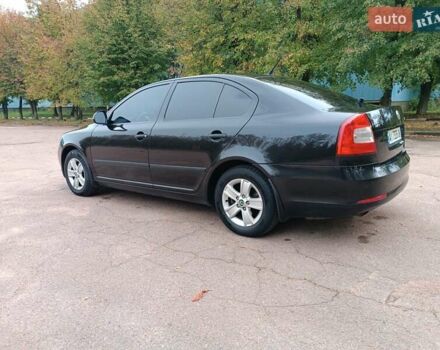 Шкода Октавия 2009 в Житомире на Automoto.ua Черный Шкода Октавия, объемом двигателя 1.6 л и пробегом 178 тыс. км за 7500 $, фото 46 на Automoto.ua